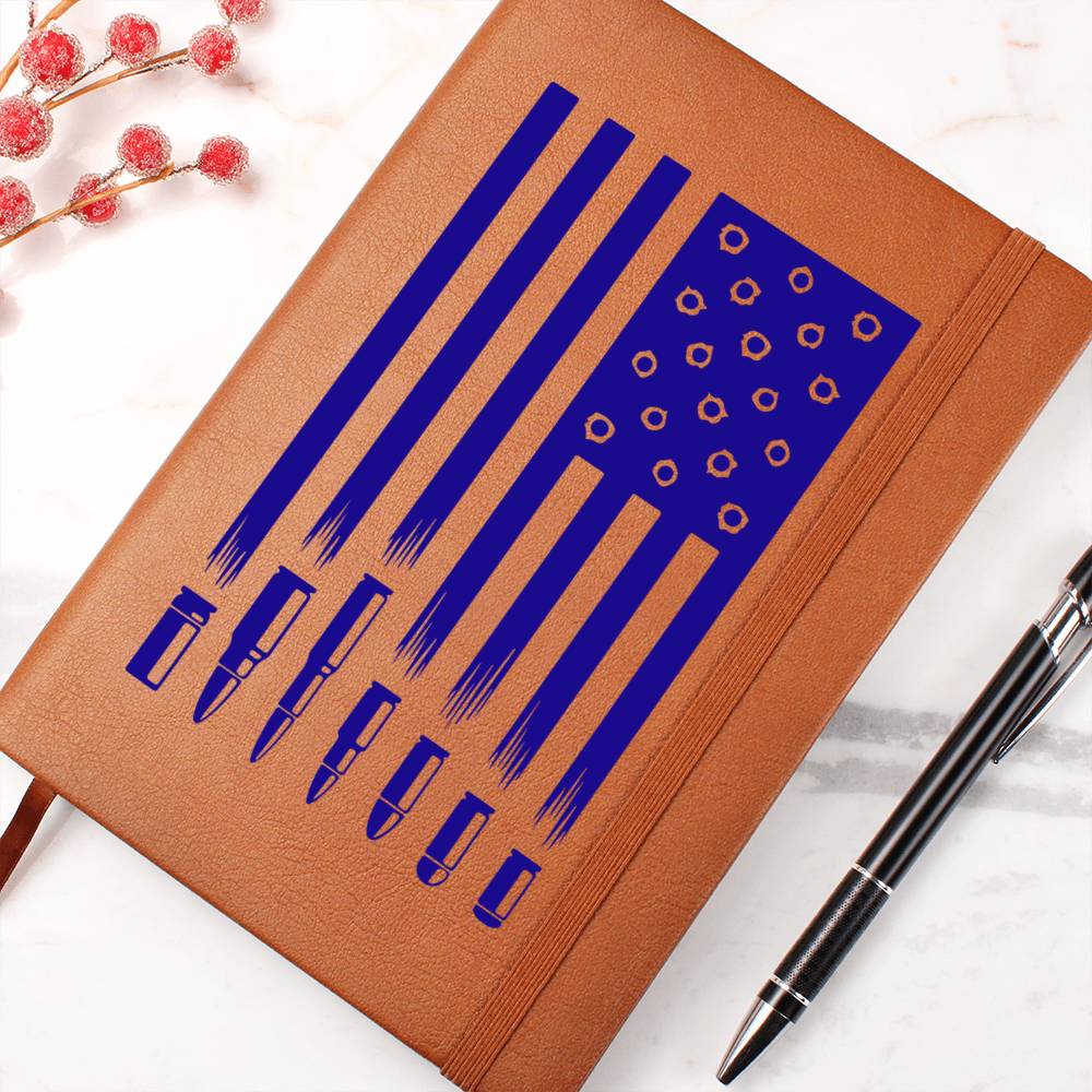 This American flag journal with bullet holes in blue on a vegan leather 100 page, lined journal may just be the best gift ever
