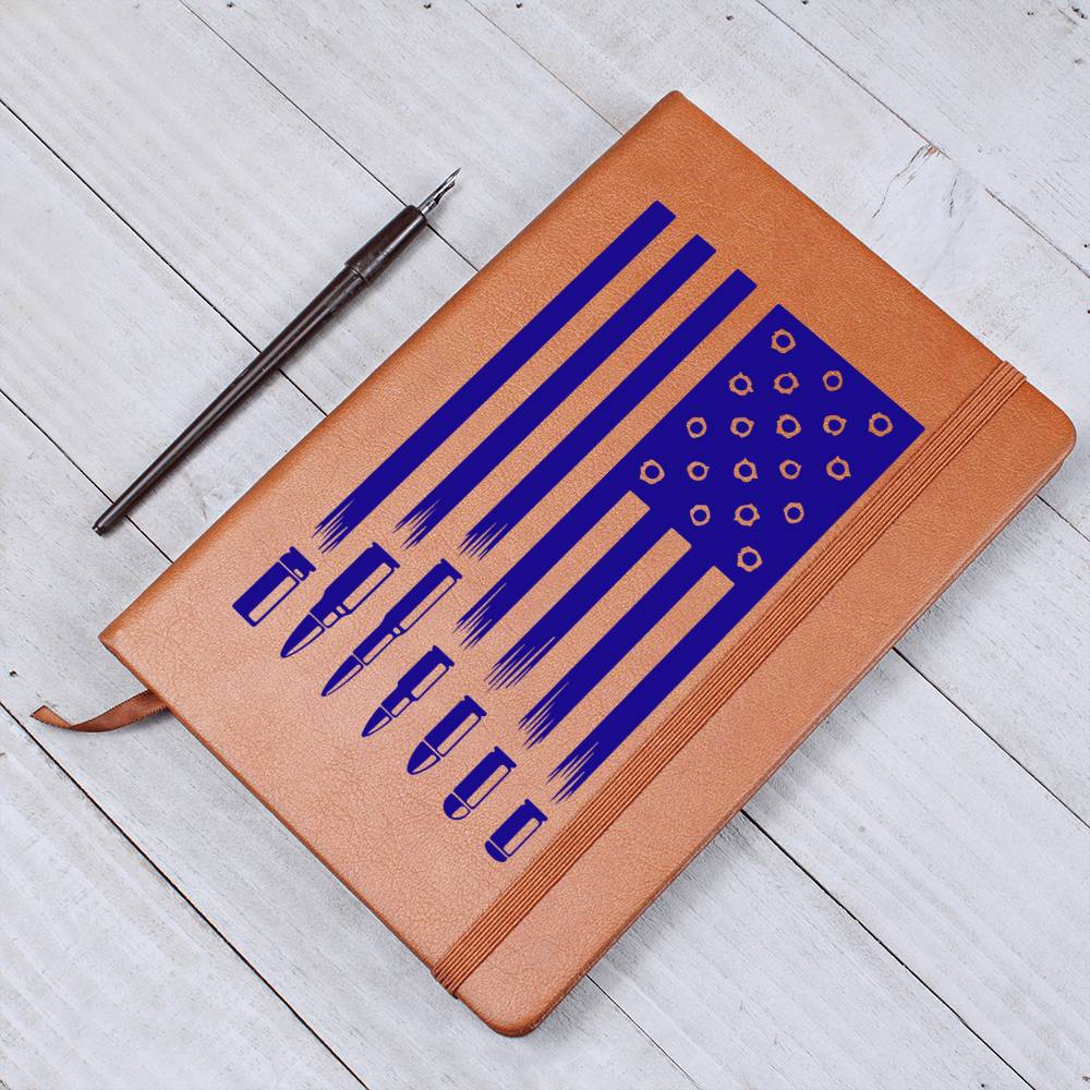 This American flag journal with bullet holes in blue on a vegan leather 100 page, lined journal may just be the best gift ever